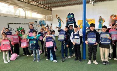 أمل جديد في حقيبة صغيرة — مبادرة لمنظمة حمورابي تعزز حق الأطفال الفقراء في التعلم