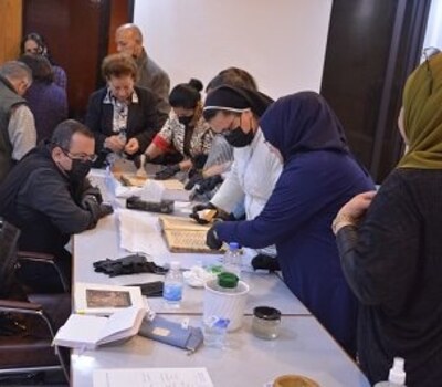 Hammurabi Human Rights Organization continues holding a workshop for the preservation and protection of Christian books and manuscripts