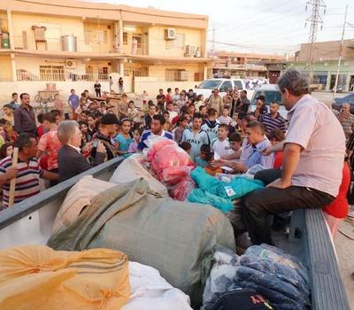 HHRO Delivering winter clothes and heaters in the Nineveh plain and Baghdad