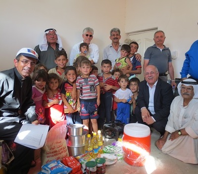 A joint team from CSI & HHRO delivering aid to IDPs from Mosul, Hamdaniya …