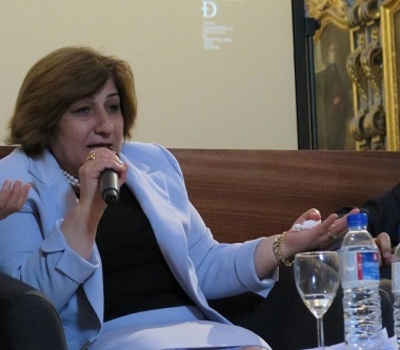 Ms. Pascale Warda participating in a conference in the Portugali municipality of Evora