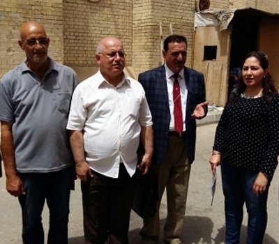 Members of the Iraqi Forum for Human Rights Organizations holding a demonstration on the second anniversary of the Islamic States occupation of Nineveh