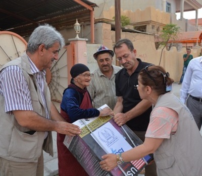 Hammurabi Human Rights Organization continues to implement its field relief program and includes (320) families in Baghdida (Karakush)  by distributing 250 domestic systems for purification and desalination of water
