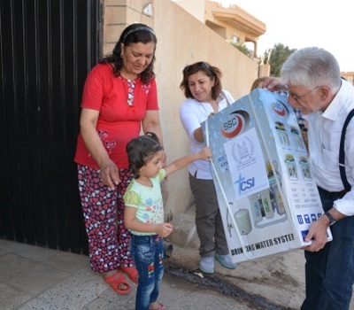 A joint relief team of Hammurabi Human Rights Organization and the Christian Solidarity International (CSI) head to Tellesqaf and Baqofah towns and distribute (227) domestic water filtration and desalination system