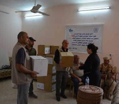 In support of the returnees, Hammurabi Human Rights Organization distributes 230 food baskets in the town of Karamlis.