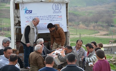 قريتا صوركا و بندوايا في محافظة دهوك تشهدان توزيع 155 سلة غذائية و صحية قدمتها منظمة حمورابي لحقوق الإنسان