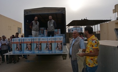 A joint team of Hammurabi Human Rights Organization and Christian Solidarity International CSI distributes household water filtration and desalination systems to 103 family returning to Bartella