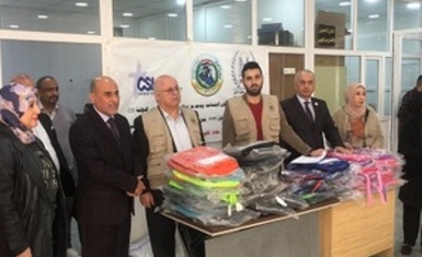 Hammurabi Human Rights Organization distributes 400 school bags with stationery supplies in support of the educational process