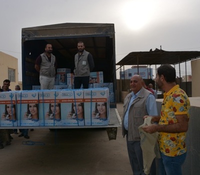 A joint team of Hammurabi Human Rights Organization and Christian Solidarity International CSI distributes household water filtration and desalination systems to 103 family returning to Bartella