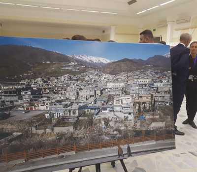 Mrs. Pascale Warda, Mr. William Warda and Dr. Hamid Shehab attend the opening of a photographic exhibition held by the British Embassy in Baghdad